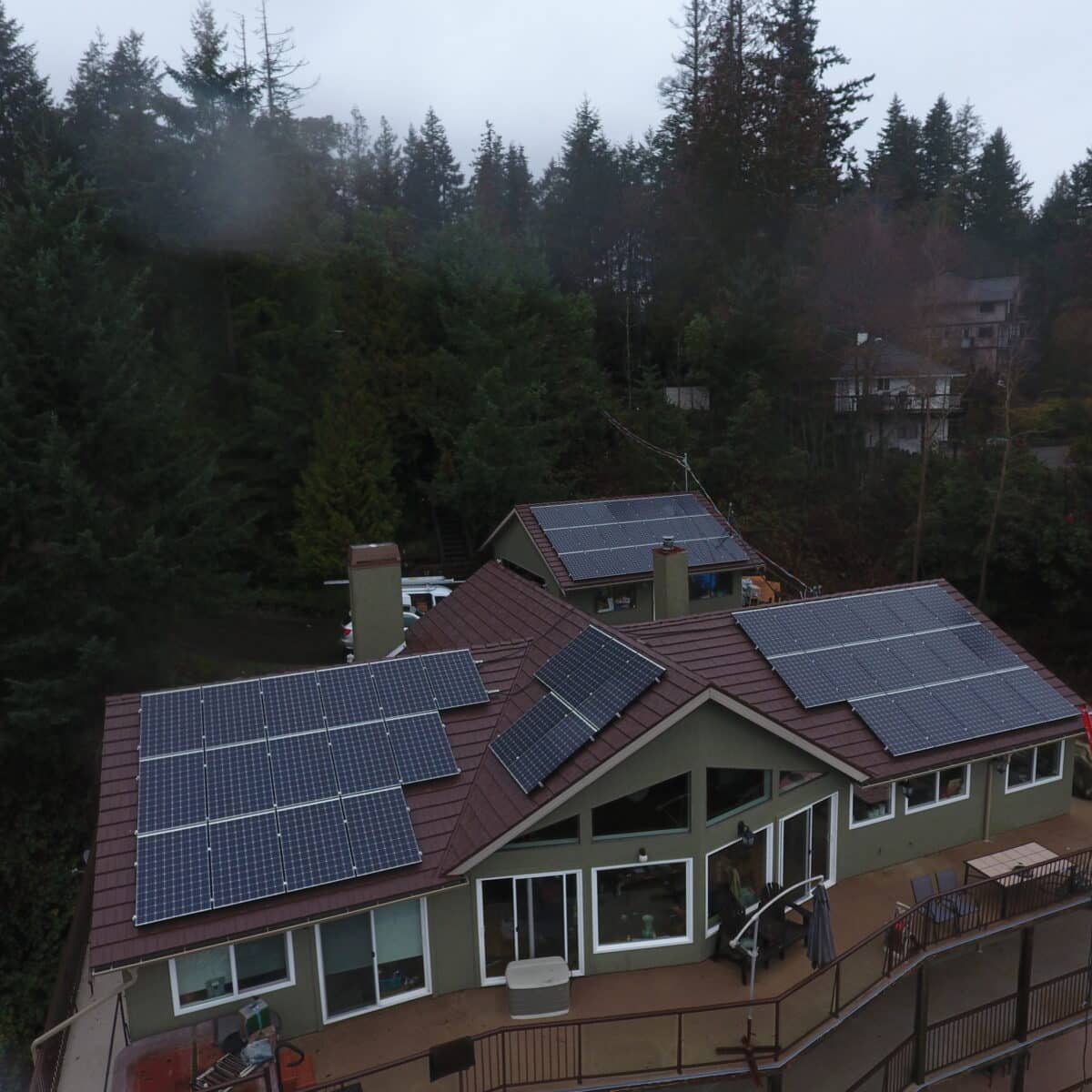 Installing solar panels on house rooftops in Malahat, BC